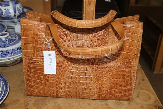Stamped leather handbag